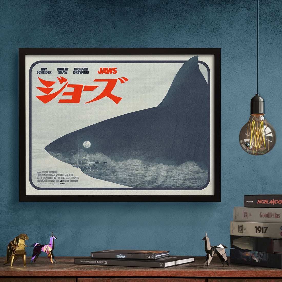 Jaws Japanese variant movie poster by Matt Needle framed on a wall